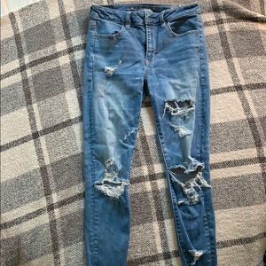 Distressed medium- light color skinny jeans